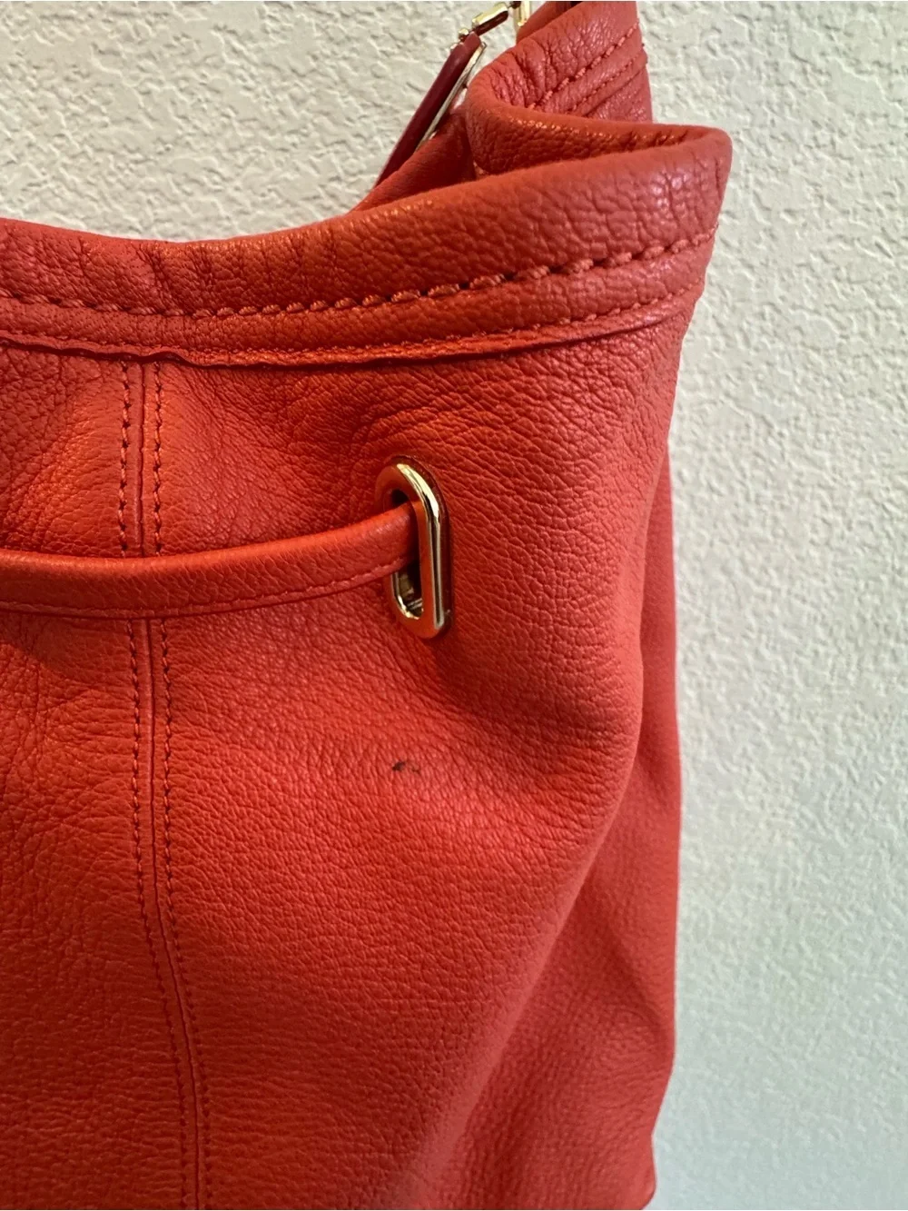 Coach Twist Lock Coral-Orange Pebbled Leather Drawstring Shoulder Bag
